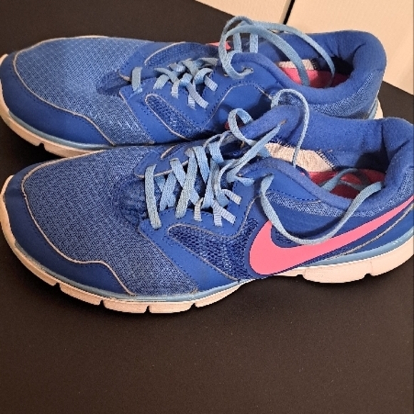 Nike Shoes - Nike Women's Blue Running Shoes GUC. See pics for flaws. Plenty of wear left.